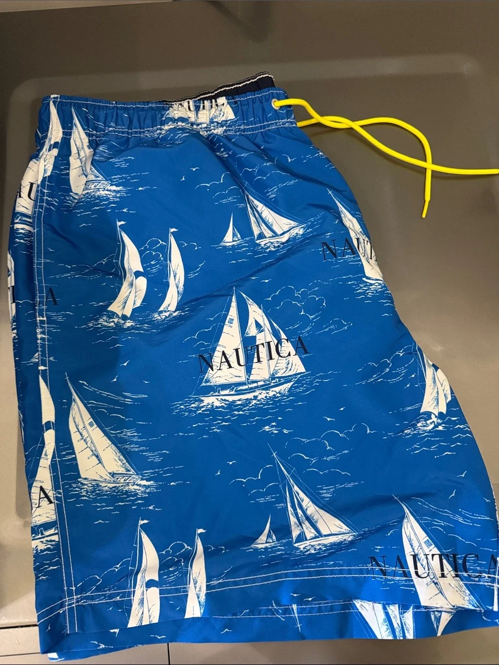 Nautica Blue Sailboat Print Swim Shorts with Yellow Drawstring